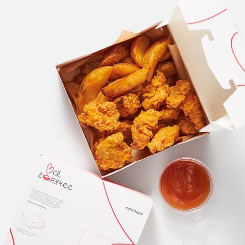 Изображение товара Куриные байтсы Самокат, с чёрным перцем, с картофелем по-деревенски и кисло-сладким соусом, 385 г